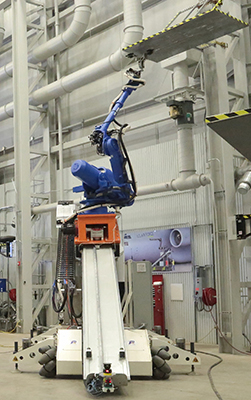 首先多用途机器人设计用于航空航天工厂车间使用的飞机打磨，并使用先进的传感器，因为它移动飞机周围进行实时路径规划和分析涂层去除。（西南研究所提供）