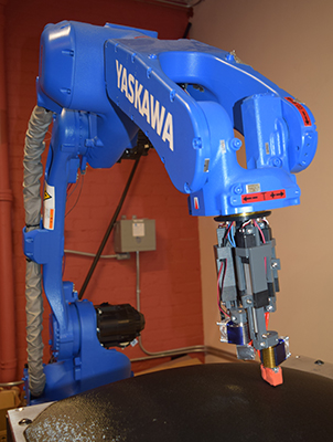 机器人3D打印在非平面表面使用开源工具生成机器人轨迹与ros启用机器人。(南加州大学提供)